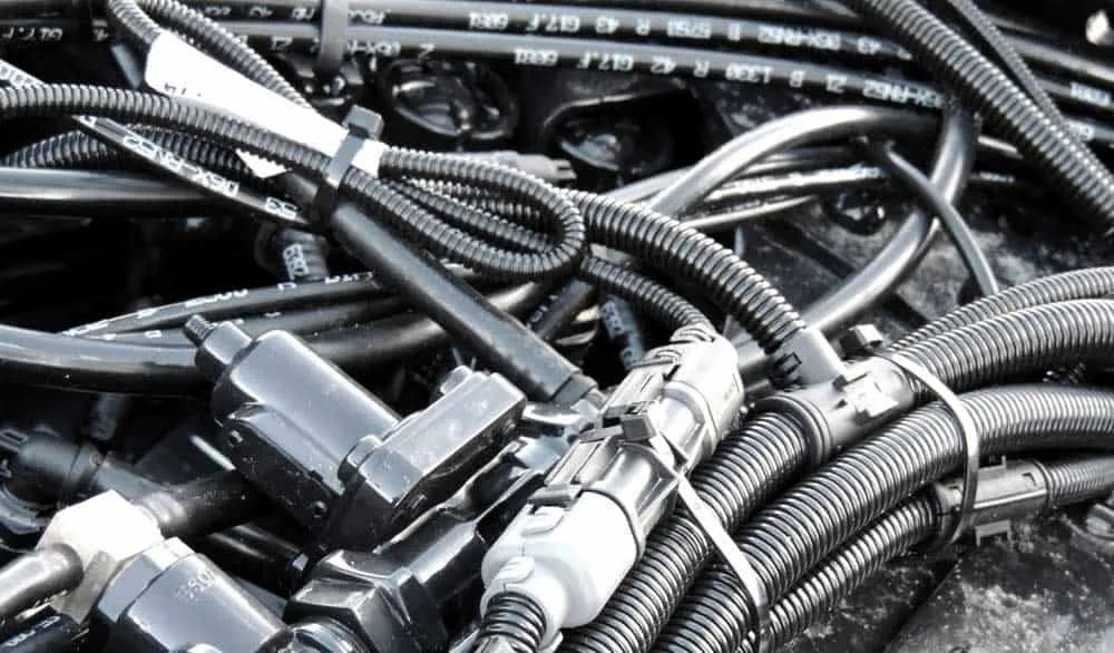 Corrugated pipe for automotive wiring harness protection