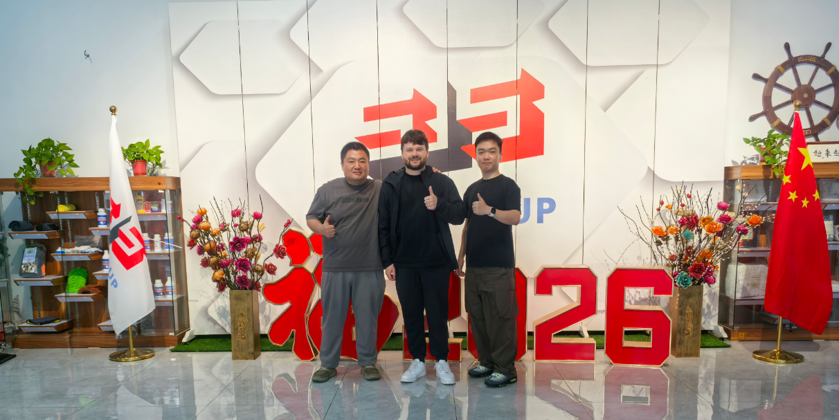 sjs-group-manager-and-canadian-client-posing-factory-tour-cotton-rags.png