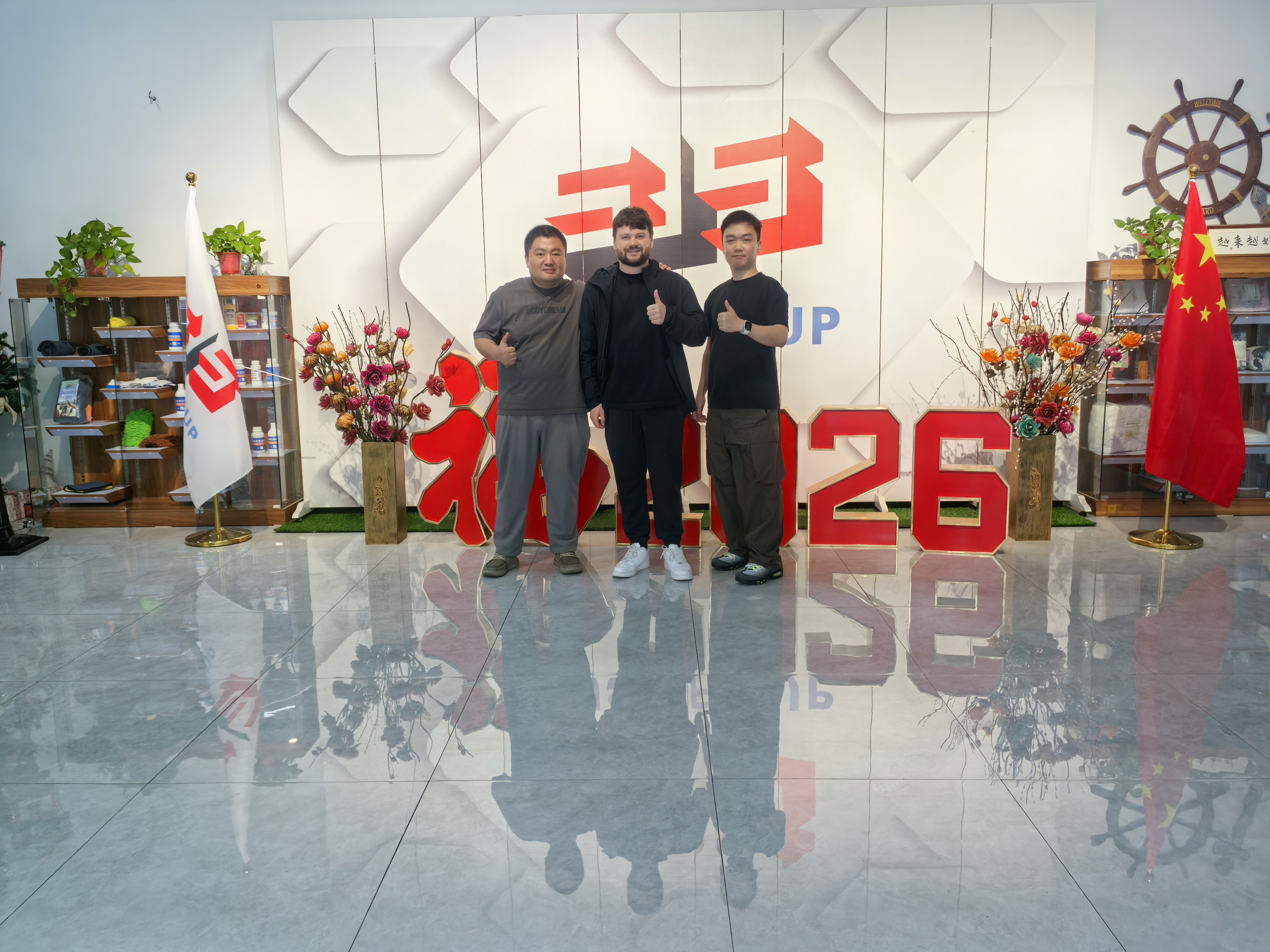sjs-group-manager-and-canadian-client-posing-factory-tour-cotton-rags1.jpg