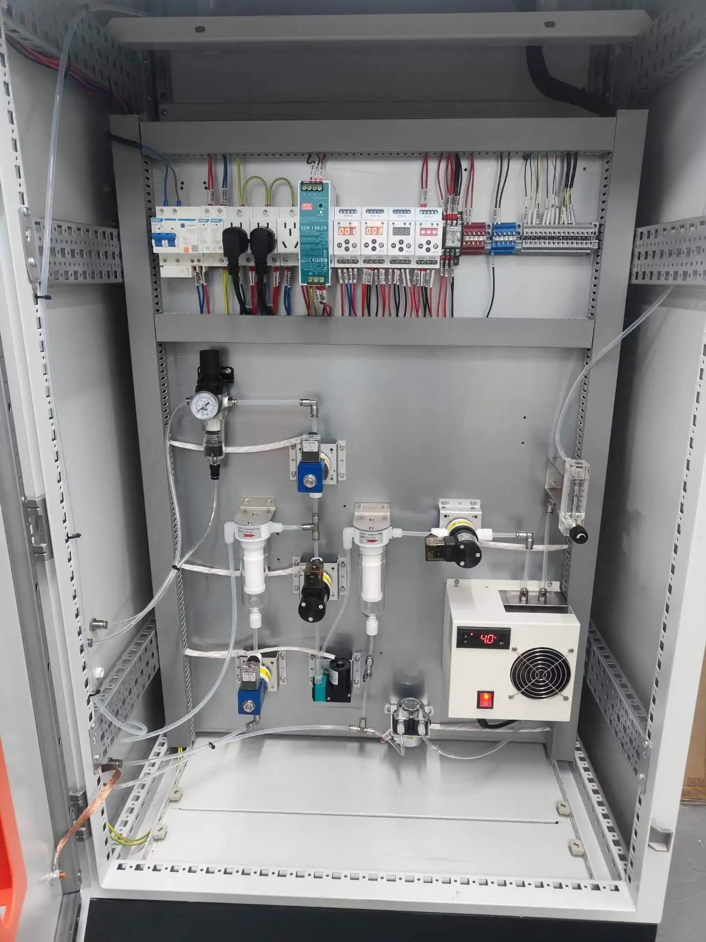 Internal view of the Stack Gas Pre-treatment Cabinet showing precision multi-stage filters and cooling modules