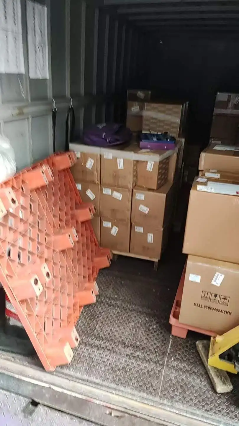 A shipping container loaded with boxes and pallets of Skyeaglee gas detection equipment ready for delivery