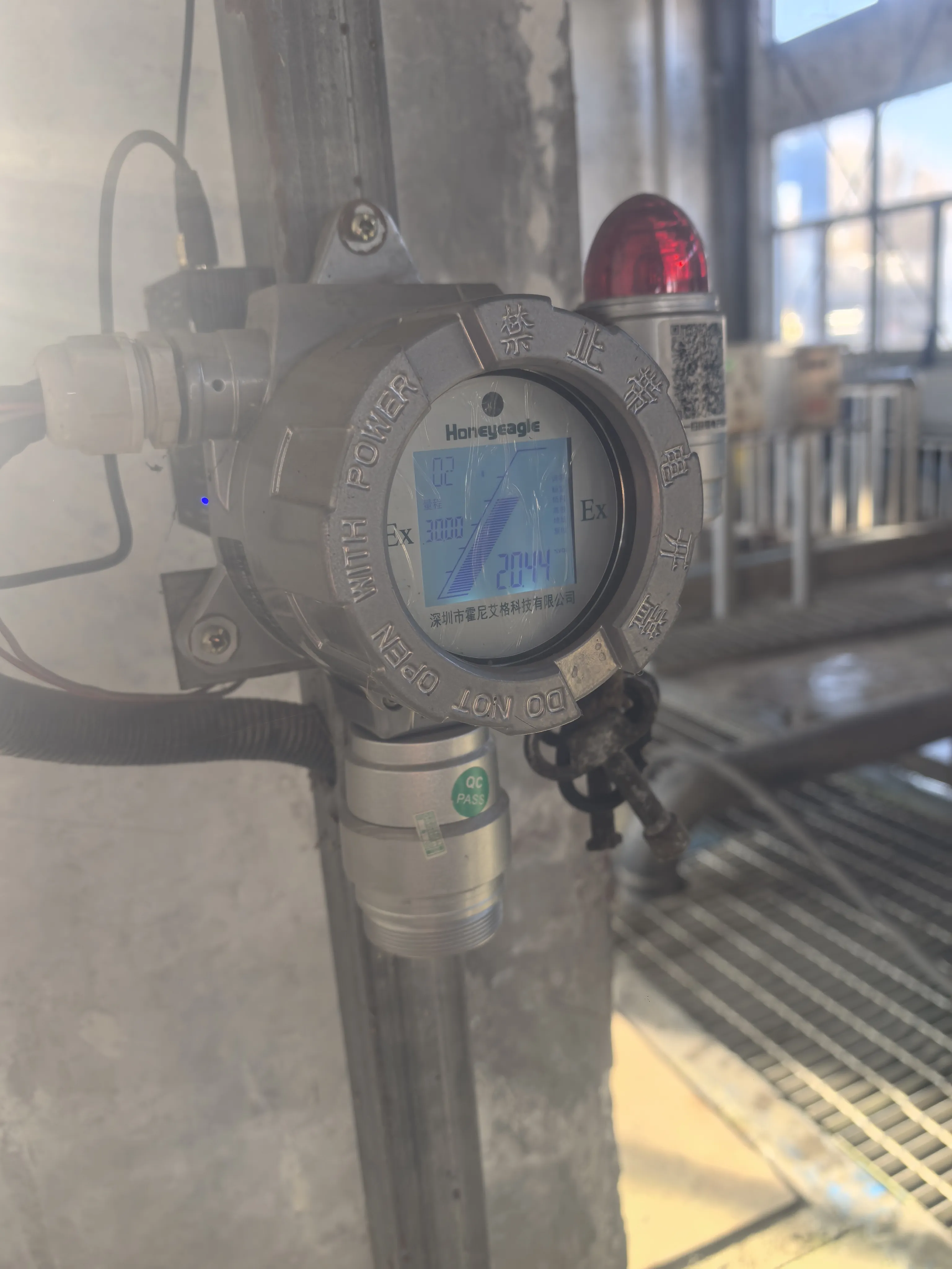 Fixed oxygen detector mounted on industrial steel structure monitoring O2