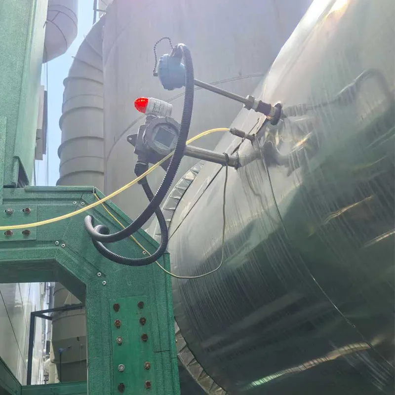 IP66 flange-mounted insertion dust detector installed on an outdoor industrial silo