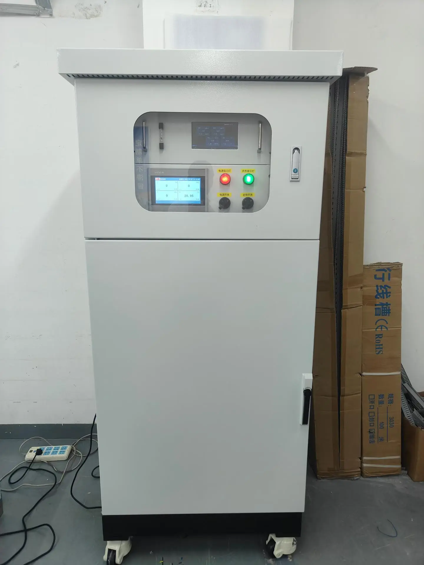 Skyeaglee CEMS Sample Conditioning System cabinet undergoing factory power-on debugging